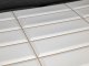 Flexpanel PVC falburkoló lap - Metró csempe fehér, arany fugával