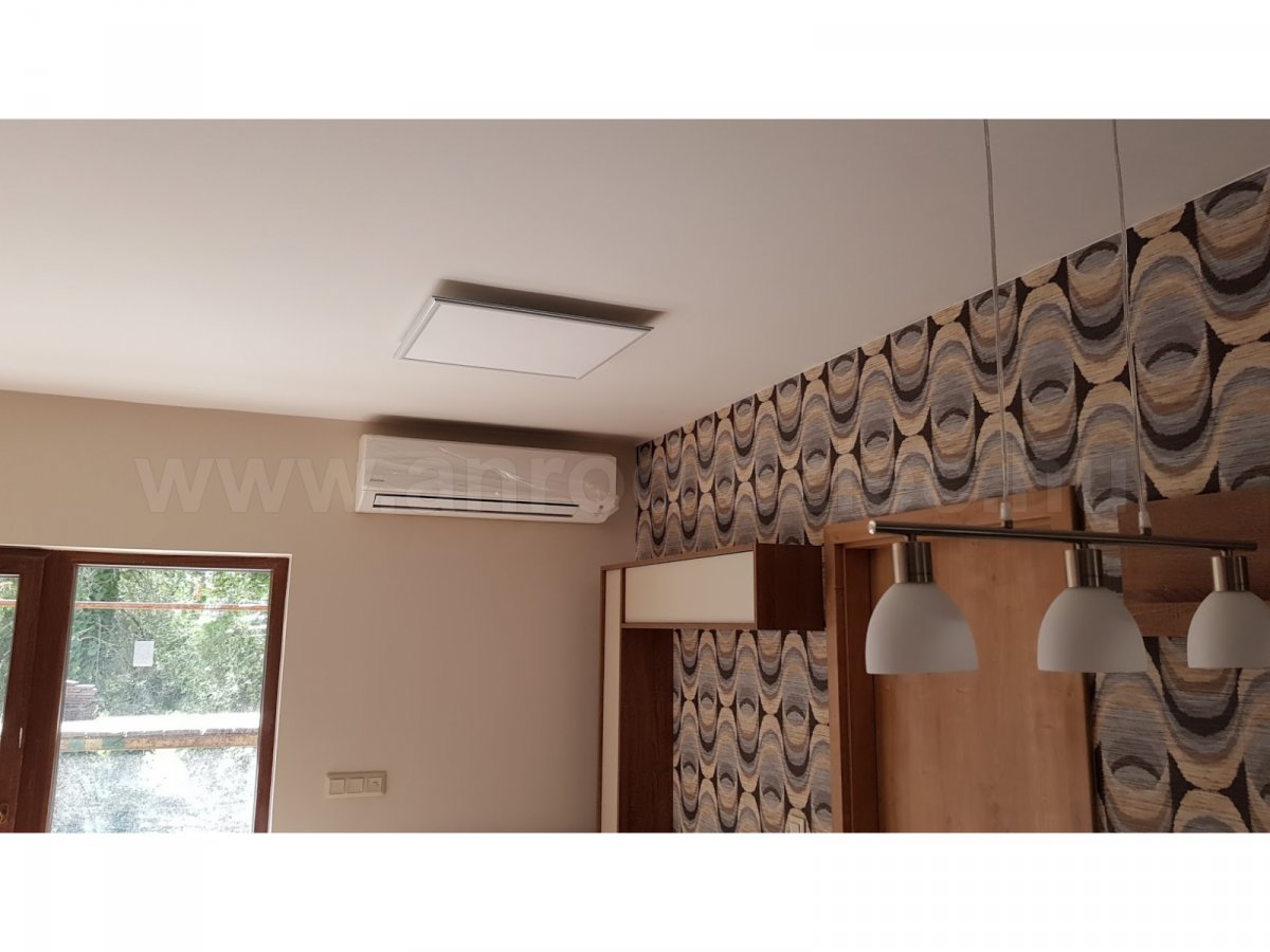 LED paneles világítás nappaliban: lapos, de nagy fényt adó 60x60 cm panel